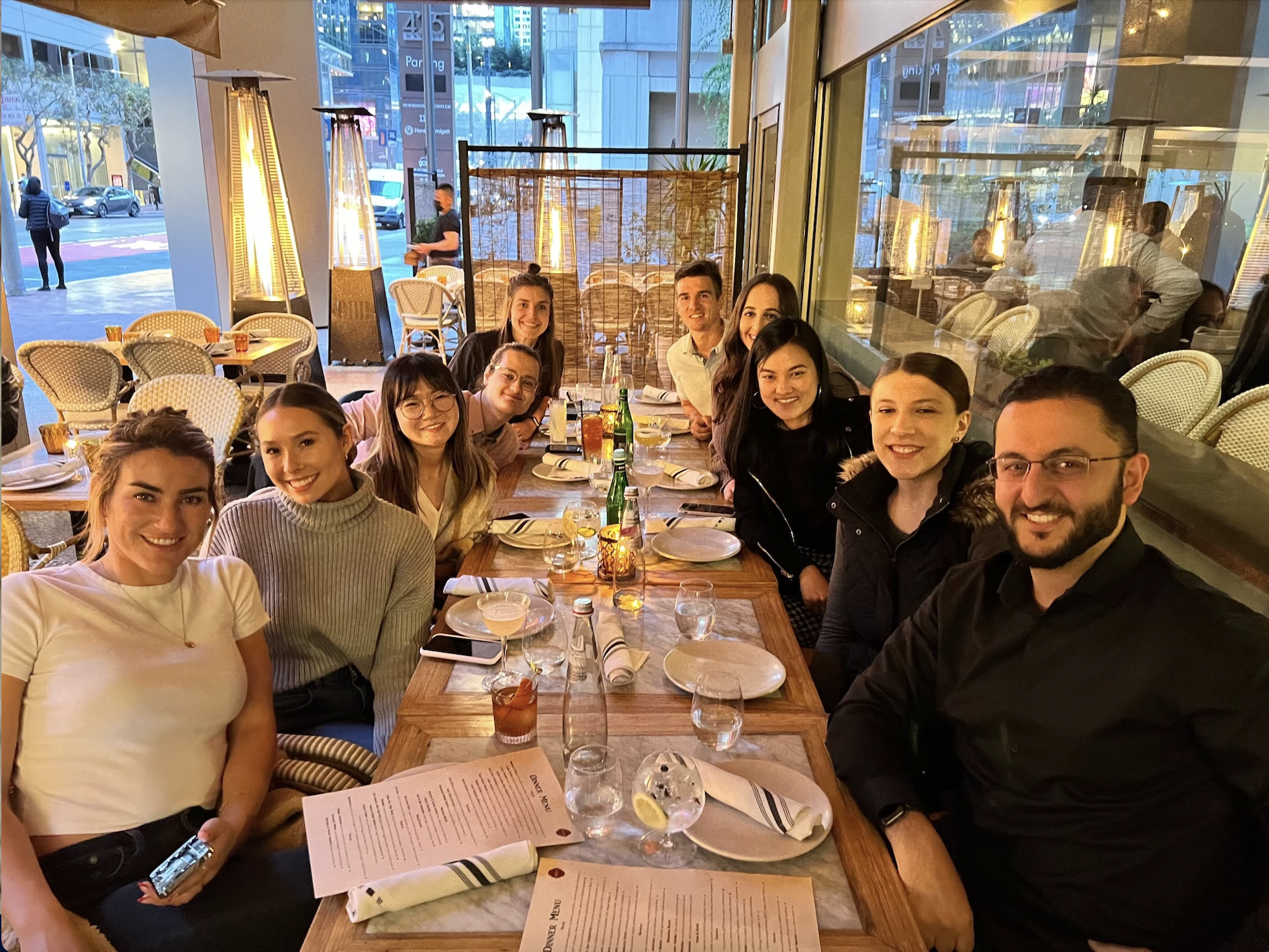 A group of CodeSignal employees together at a restaurant.