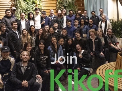 The Kikoff team poses for a group photo at their office with the phrase “Join Kikoff” overlaid on the photo.