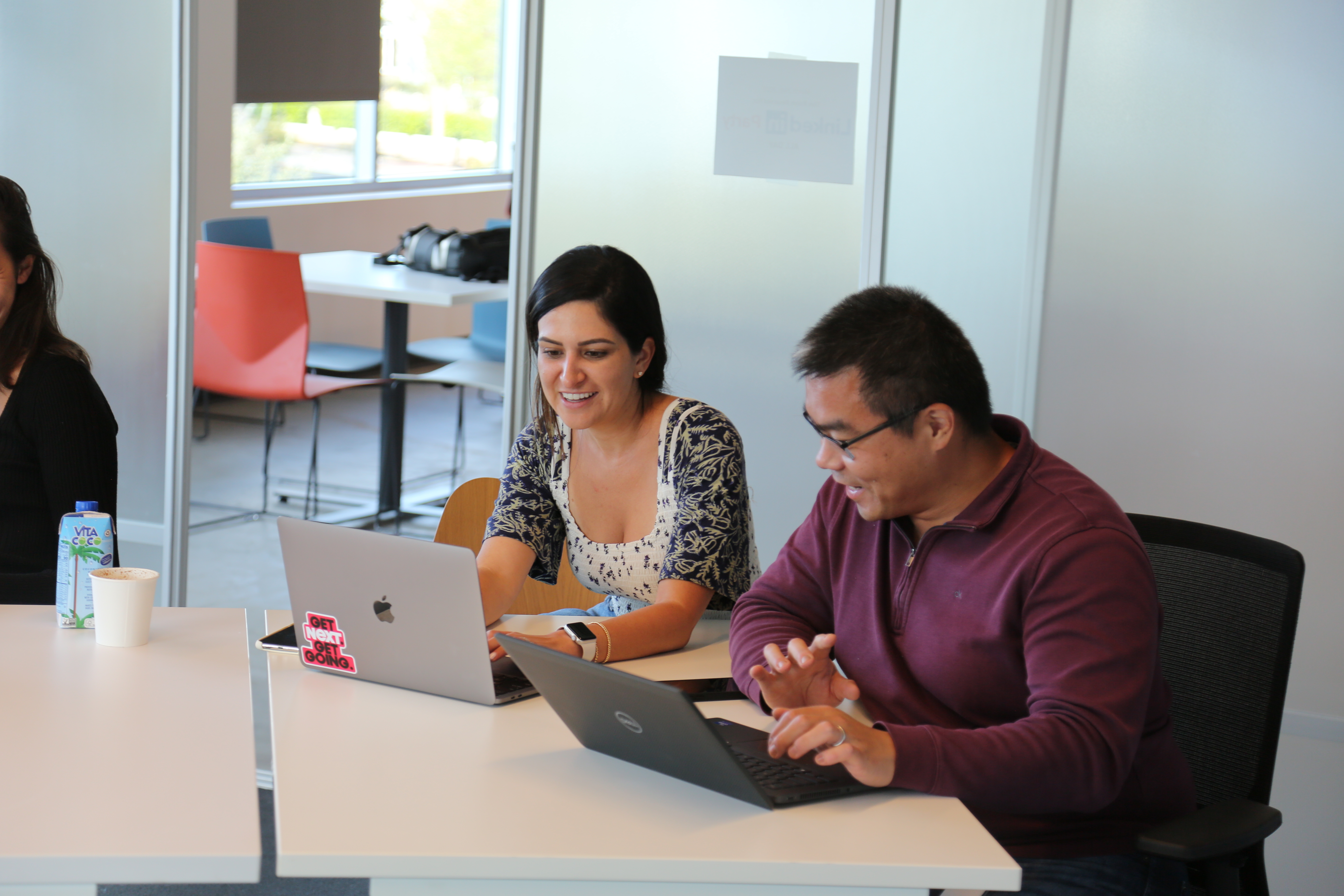 next insurance team members working together in office