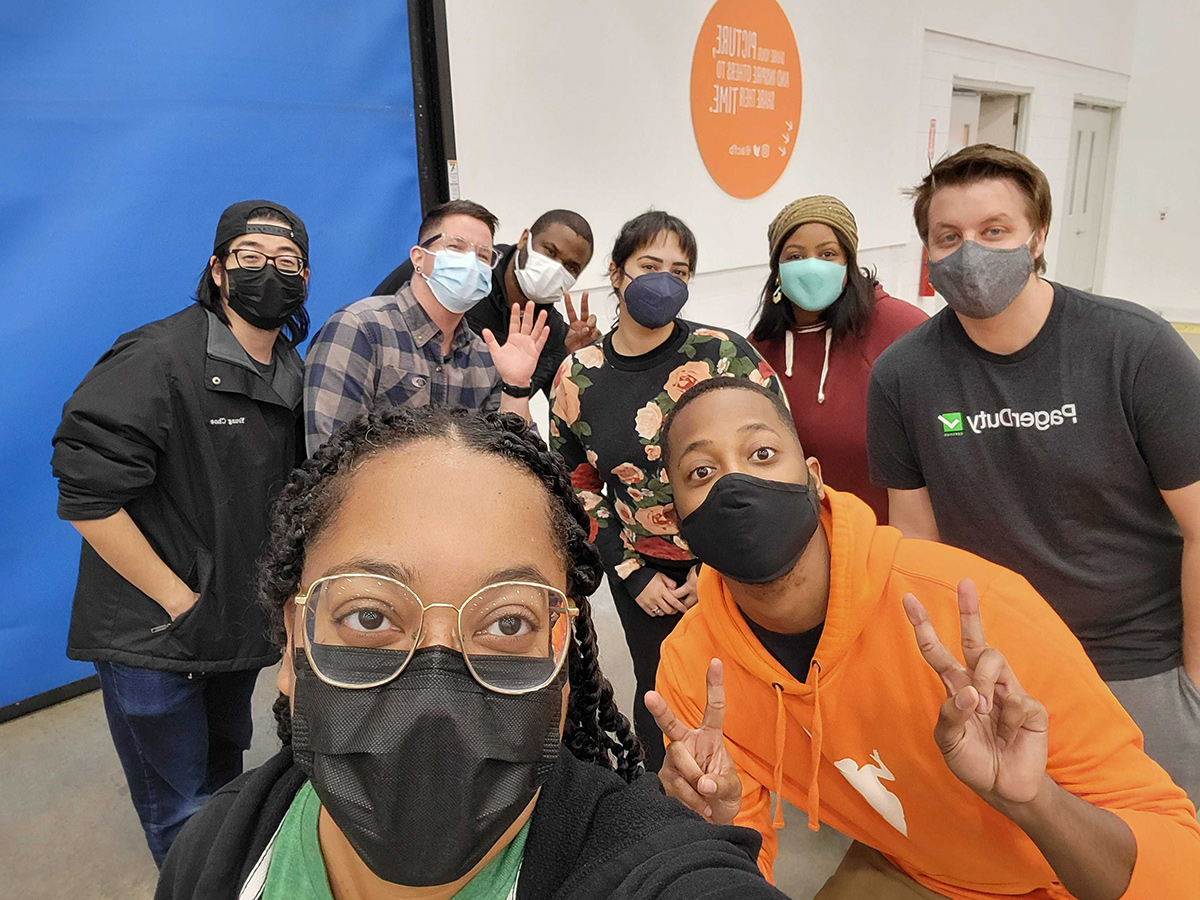 PagerDuty team members gather for a group selfie at the office