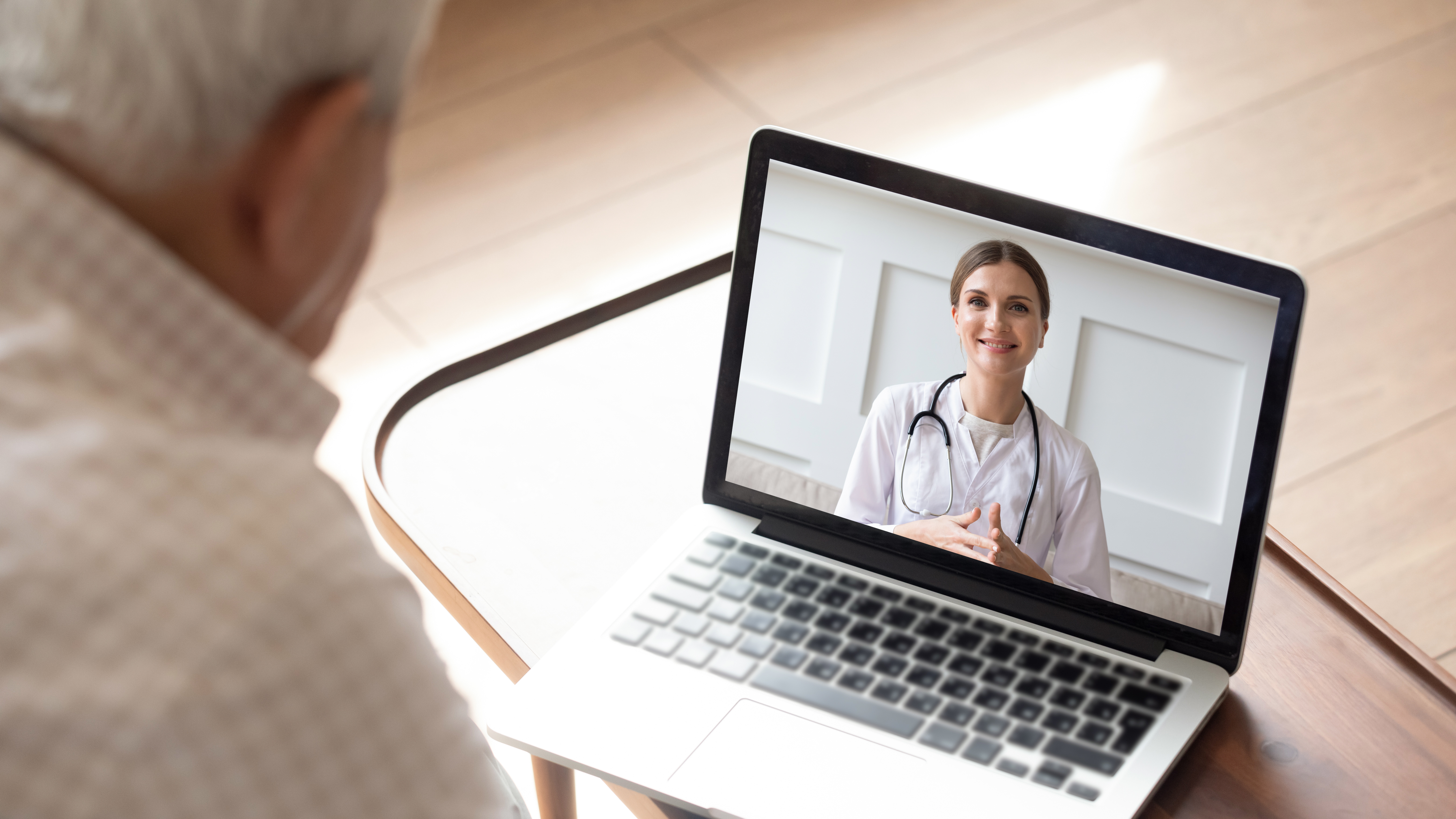 senior uses telehealth