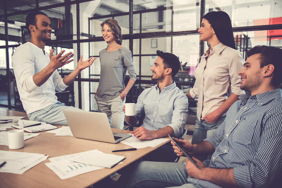 people in an office talking