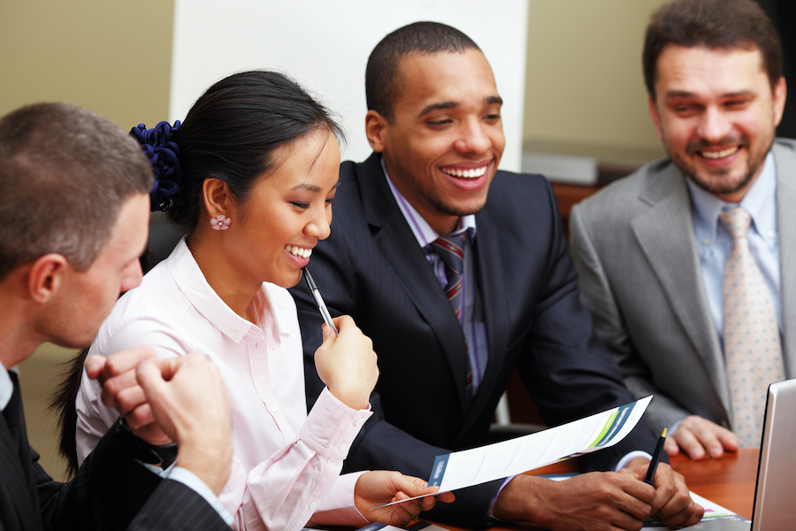 people in an office talking